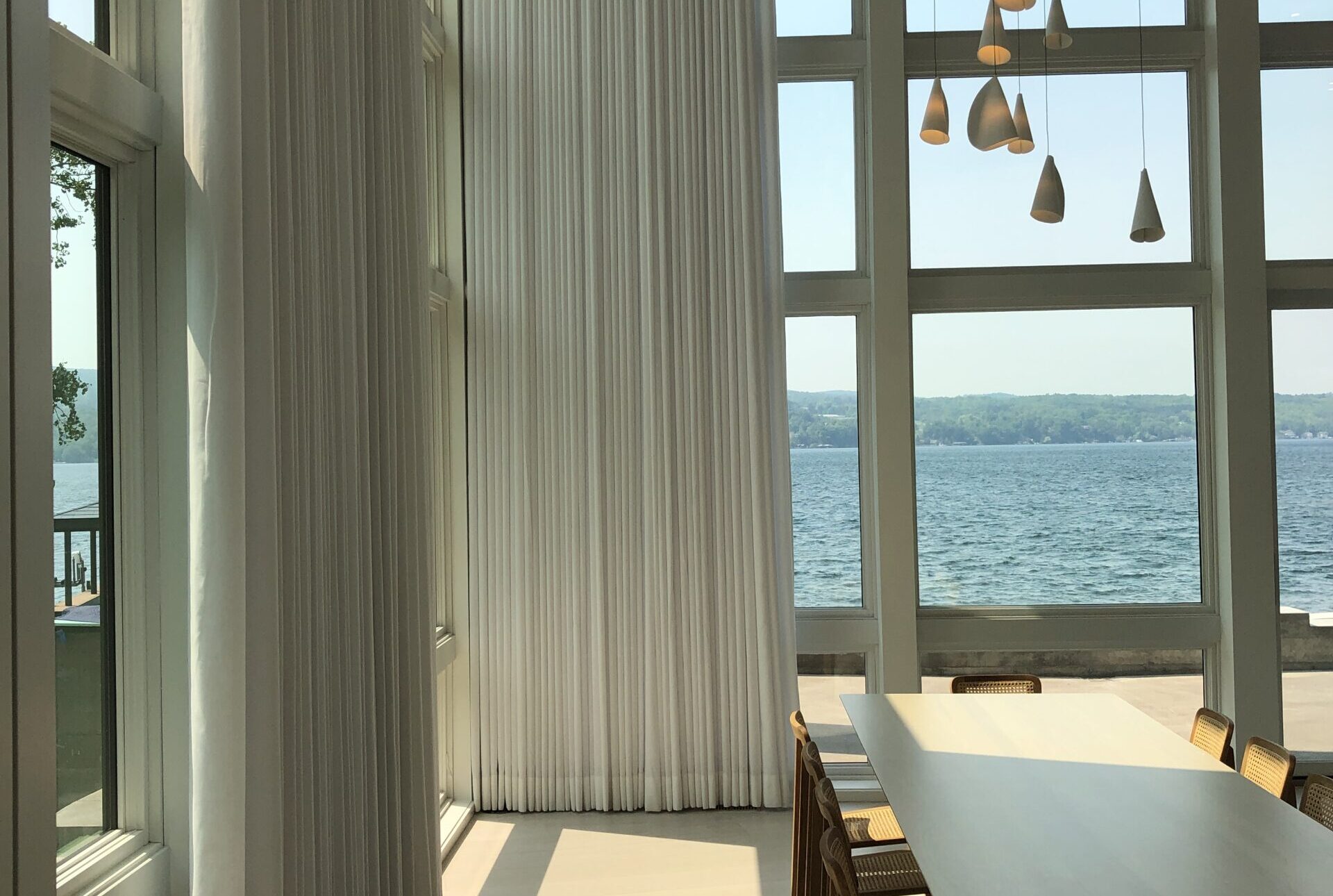 Reaching New Heights: A Custom Two-Story Lake House Drapery Installation