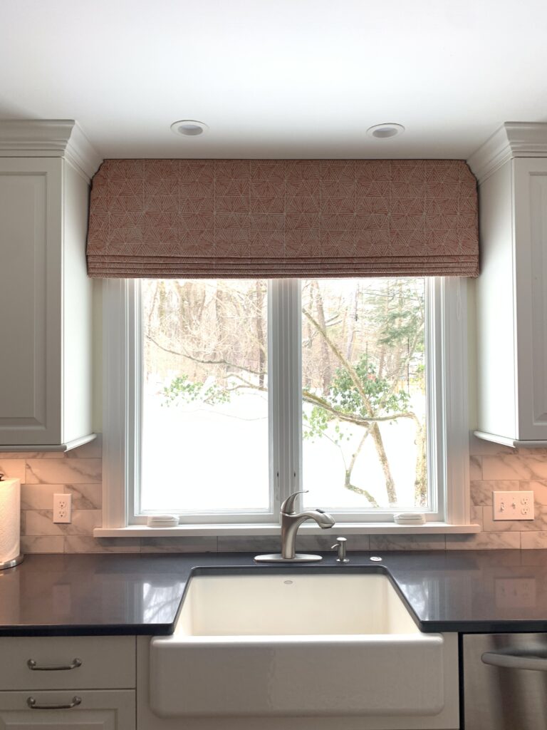 Faux Roman shade with custom contoured top fitted to crown molding