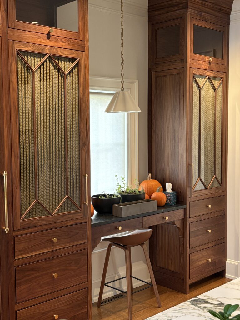 Cabinet panels conceal inner contents while keeping the lightness the glass brings.