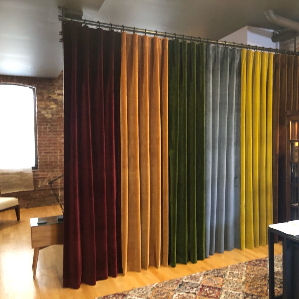 Room dividers create separate areas in open concept spaces.